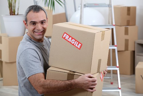 People preparing boxes for a London removal