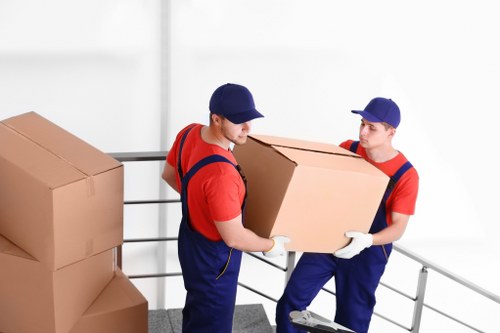 Removal team planning a home move in a London street
