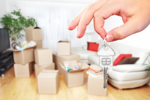 Removal team planning a house move in a London street