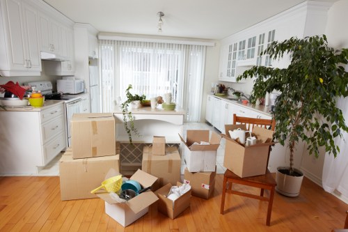 Furniture and boxes being loaded into a moving van