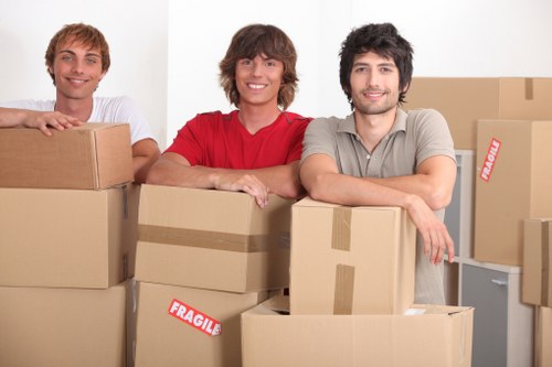 Moving crew handling furniture carefully