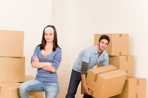 London movers handling furniture and boxes with attention to detail